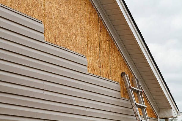 Professional Siding Contractor technician working in Trafford, PA
